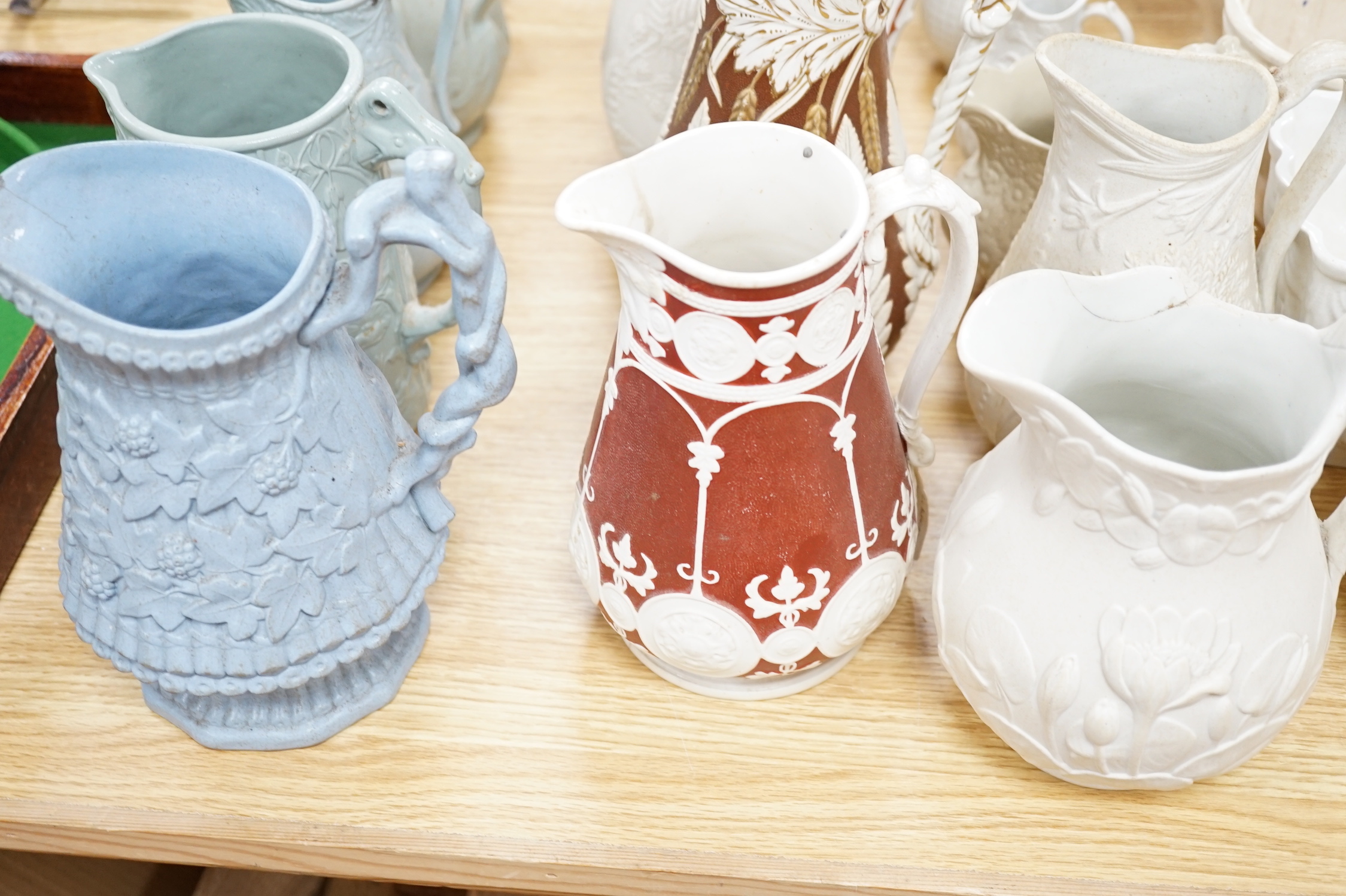 Large collection of mostly 19th century ceramics including Staffordshire figures, jugs, jelly moulds and a twin handled cup, the largest 24cm high
